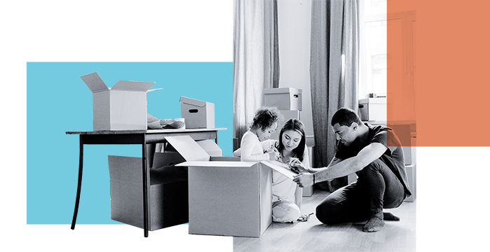 Three friends putting furniture together